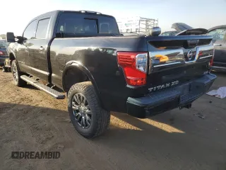 2016 Nissan Titan XD Platinum Reserve with VIN 1N6BA1F40GN506668, listed as a Copart auction lot 76357204 with 89,839 mi miles and Salvage Title. Bid and sale history available at carsss.com. Image 2.