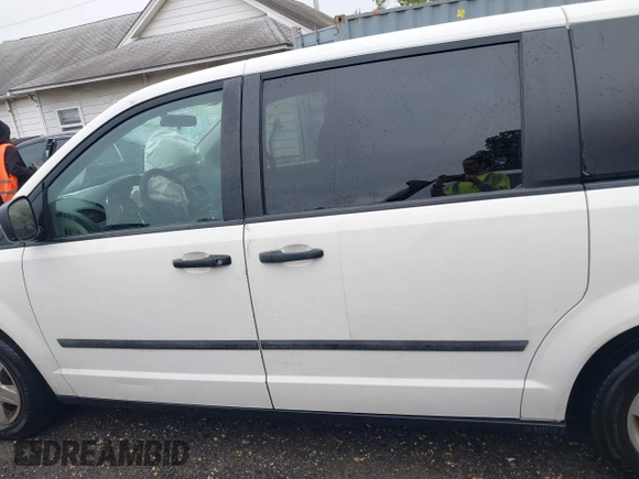 2011 Dodge Grand Caravan Cargo with VIN 2D4RN1AG5BR601684, listed as a IAAI auction lot 40406009 with 207,242 mi miles. Bid and sale history available at carsss.com. Image 14.