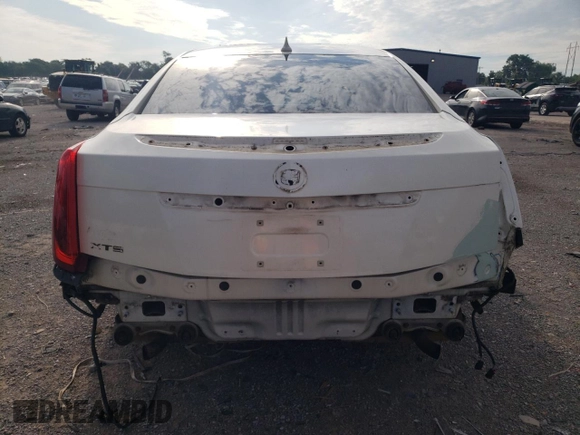 2013 Cadillac XTS Luxury with VIN 2G61P5S37D9186395, listed as a Copart auction lot 56859015 with 132,458 mi miles and Salvage title. Bid and sale history available at DreamBid. Image 6.