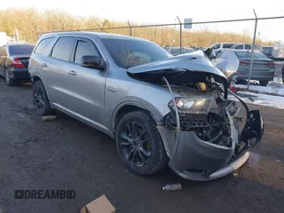 2020 Dodge Durango R/T with VIN 1C4SDJCT0LC257400, listed as a IAAI auction lot 41445681 with 64,763 mi miles and . Bid and sale history available at DreamBid. Image 1.