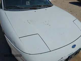 1996 Ford Probe z VIN 1ZVLT22B0T5127219, wystawiony jako IAAI lot #42279311 z przebiegiem 123 290 mil mil oraz . Historia ofert i sprzedaży dostępna na DreamBid. Obrazek 6.