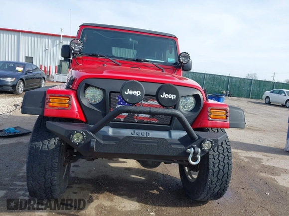 2004 Jeep Wrangler Sport with VIN 1J4FA49S54P744171, listed as a IAAI auction lot 41974657 with 173,230 mi miles. Bid and sale history available at carsss.com. Image 12.