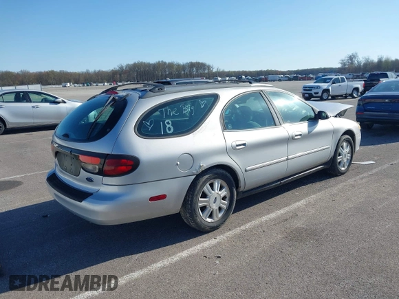2003 Ford Taurus z VIN 1FAHP59U83A234246, wystawiony jako IAAI lot #41975597 z przebiegiem 178 869 mil mil oraz . Historia ofert i sprzedaży dostępna na DreamBid. Obrazek 4.