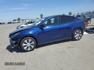 2024 Tesla Model Y Long Range z VIN 7SAYGAEE3RF034699, wystawiony jako Copart lot #54523815 z przebiegiem 9 764 mil mil oraz Szkoda całkowita • Salvage title. Historia ofert i sprzedaży dostępna na DreamBid. Obrazek 1.