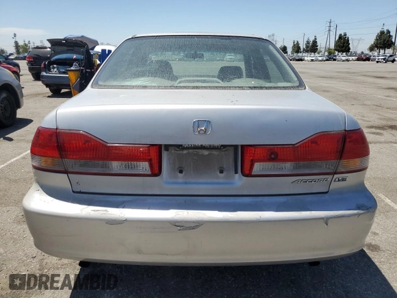2002 Honda Accord EX z VIN 1HGCG16582A001090, wystawiony jako Copart lot #58244785 z przebiegiem 99 158 mil mil oraz Szkoda całkowita • Salvage title. Historia ofert i sprzedaży dostępna na DreamBid. Obrazek 6.