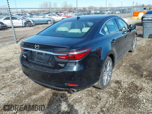 2021 Mazda 6 Signature with VIN JM1GL1XY7M1615149, listed as a IAAI auction lot 41851158 with 47,690 mi miles and . Bid and sale history available at DreamBid. Image 4.