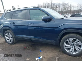 2021 Volkswagen Atlas SE with VIN 1V2JP2CA1MC548186, listed as a IAAI auction lot 41209054 with 99,071 mi miles and . Bid and sale history available at DreamBid. Image 13.