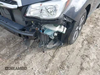 2018 Subaru Forester Premium with VIN JF2SJAGC0JH452501, listed as a IAAI auction lot 41871403 with 65,412 mi miles. Bid and sale history available at carsss.com. Image 18.