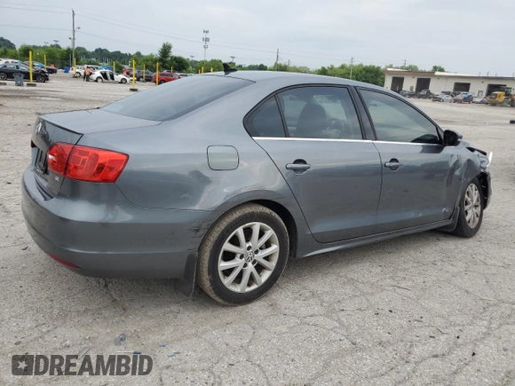 2014 Volkswagen Jetta SE with VIN 3VWD07AJ7EM363186, listed as a Copart auction lot 60873465 with 215,323 mi miles and Salvage title. Bid and sale history available at DreamBid. Image 3.