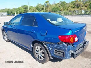 2009 Toyota Corolla with VIN JTDBL40E999021523, listed as a IAAI auction lot 42019856 with 194,011 mi miles. Bid and sale history available at carsss.com. Image 3.