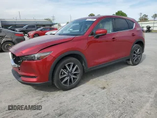 2018 Mazda CX-5 Grand Touring z VIN JM3KFADM6J0444177, wystawiony jako Copart lot #52373565 z przebiegiem 79 681 mil mil oraz Czysty tytuł • Clean title. Historia ofert i sprzedaży dostępna na DreamBid. Obrazek 1.