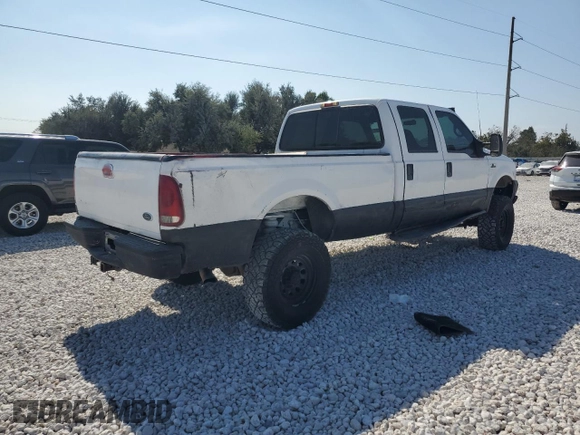 2000 Ford Super Duty F-250 XL with VIN 1FTNW21SXYEA52699, listed as a Copart auction lot 78659054 with 154,056 mi miles and Salvage Title. Bid and sale history available at carsss.com. Image 3.