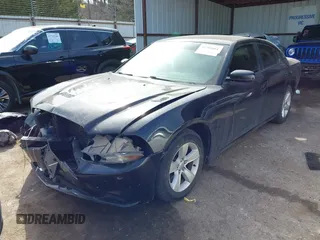 2014 Dodge Charger SE with VIN 2C3CDXBG8EH267589, listed as a IAAI auction lot 41793004 with 154,771 mi miles and . Bid and sale history available at DreamBid. Image 2.