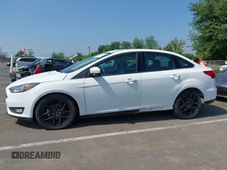 2016 Ford Focus SE with VIN 1FADP3F20GL329898, listed as a IAAI auction lot 42844995 with 20,485 mi miles and . Bid and sale history available at DreamBid. Image 6.