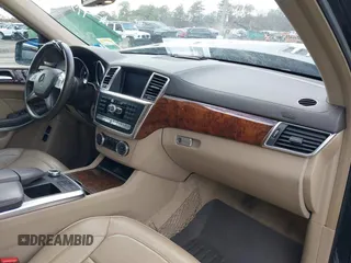 2014 Mercedes-Benz GL-Class GL 550 with VIN 4JGDF7DE2EA313661, listed as a IAAI auction lot 41214931 with 102,469 mi miles. Bid and sale history available at carsss.com. Image 5.