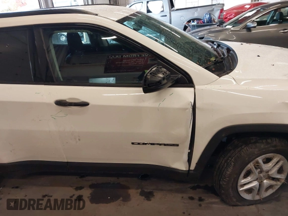 2018 Jeep Compass Sport with VIN 3C4NJCAB6JT124198, listed as a IAAI auction lot 41192196 with 104,557 mi miles. Bid and sale history available at carsss.com. Image 21.
