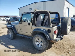 2006 Jeep Wrangler Rubicon with VIN 1J4FA69S36P744801, listed as a Copart auction lot 46541575 with 164,347 mi miles and Salvage title. Bid and sale history available at DreamBid. Image 2.