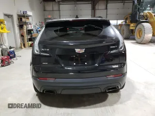 2020 Cadillac XT4 AWD Sport с VIN 1GYFZFR46LF006695, выставлен на аукционе Copart как лот 83306014 с пробегом 33 376 миль миль и Списание • Salvage title. История ставок и продаж доступна на DreamBid. Изображение 6.
