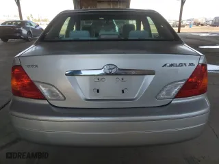 2001 Toyota Avalon XL w/Bucket Seats with VIN 4T1BF28B41U125324, listed as a Copart auction lot 74315974 with 173,786 mi miles and Salvage Title. Bid and sale history available at carsss.com. Image 6.