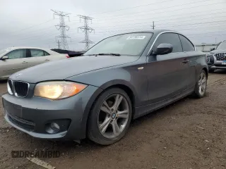 2013 BMW 1 Series 128i with VIN WBAUP7C59DVP24160, listed as a Copart auction lot 84736514 with 91,820 mi miles and Salvage Title. Bid and sale history available at carsss.com. Image 1.