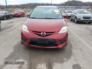 2009 Mazda Mazda5 Sport with VIN JM1CR293X90339440, listed as a IAAI auction lot 41525453 with 173,640 mi miles. Bid and sale history available at carsss.com. Image 6.