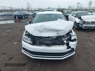 2015 Volkswagen Jetta Sedan 2.0L S with VIN 3VW2K7AJ5FM313969, listed as a IAAI auction lot 41951550 with 104,735 mi miles. Bid and sale history available at carsss.com. Image 12.