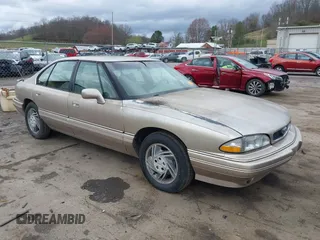 1995 Pontiac Bonneville SE z VIN 1G2HX52K5S4285062, wystawiony jako IAAI lot #41918224 z przebiegiem 100 660 mil mil oraz . Historia ofert i sprzedaży dostępna na DreamBid. Obrazek 1.