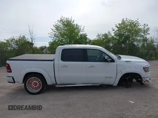2019 Ram 1500 Big Horn z VIN 1C6SRFFT6KN660091, wystawiony jako IAAI lot #42336804 z przebiegiem 59 162 mil mil oraz . Historia ofert i sprzedaży dostępna na DreamBid. Obrazek 13.
