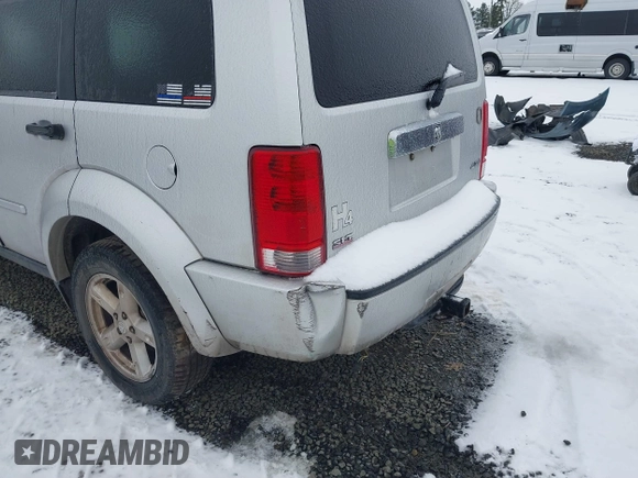2007 Dodge Nitro SLT with VIN 1D8GU58K07W734541, listed as a IAAI auction lot 41556413 with 221,119 mi miles. Bid and sale history available at carsss.com. Image 6.