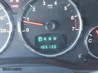 2011 Jeep Liberty Sport with VIN 1J4PP2GK4BW580280, listed as a IAAI auction lot 41482961 with 165,130 mi miles. Bid and sale history available at carsss.com. Image 16.