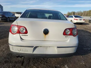2010 Volkswagen Passat with VIN WVWAK9AN7AE112988, listed as a Copart auction lot 80557614 with Not provided miles and Salvage title. Bid and sale history available at DreamBid. Image 6.