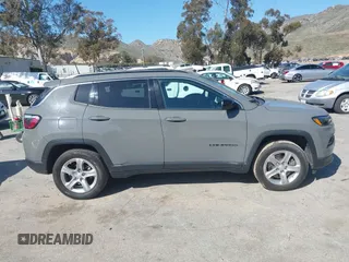 2023 Jeep Compass Latitude with VIN 3C4NJDBN5PT540444, listed as a IAAI auction lot 41820993 with 47,516 mi miles and . Bid and sale history available at DreamBid. Image 13.