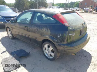2006 Ford Focus S z VIN 1FAFP31N76W249134, wystawiony jako IAAI lot #41951073 z przebiegiem 152 065 mil mil oraz . Historia ofert i sprzedaży dostępna na DreamBid. Obrazek 3.