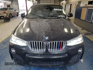 2015 BMW X4 xDrive35i with VIN 5UXXW5C51F0E88340, listed as a Copart auction lot 41765245 with 140,510 mi miles and Clean title. Bid and sale history available at DreamBid. Image 5.
