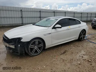 2018 BMW 6 Series 640i with VIN WBA6D0C52JG852877, listed as a Copart auction lot 63553794 with 0 mi miles and Salvage Title. Bid and sale history available at carsss.com. Image 1.