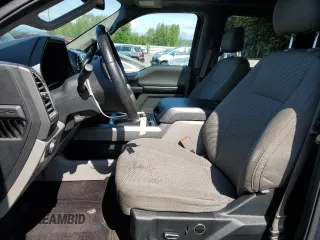 2015 Ford F-150 XLT with VIN 1FTEW1EP7FKE12574, listed as a Copart auction lot 59519985 with 133,337 mi miles and Salvage title. Bid and sale history available at DreamBid. Image 7.