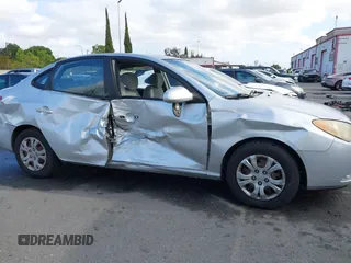 2009 Hyundai Elantra SE z VIN KMHDU46D89U711633, wystawiony jako IAAI lot #42239722 z przebiegiem 156 270 mil mil oraz . Historia ofert i sprzedaży dostępna na DreamBid. Obrazek 13.
