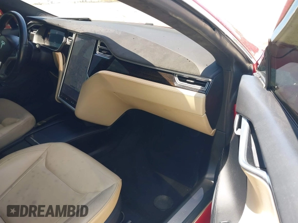 2016 Tesla Model S 90D with VIN 5YJSA1E48GF144821, listed as a IAAI auction lot 42206473 with 129,624 mi miles and . Bid and sale history available at DreamBid. Image 5.