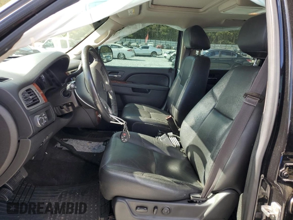 2013 Chevrolet Suburban LTZ with VIN 1GNSCKE0XDR364889, listed as a Copart auction lot 77598334 with 161,656 mi miles and Salvage Title. Bid and sale history available at carsss.com. Image 7.