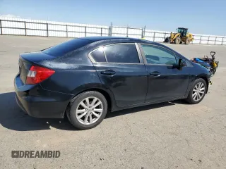2012 Honda Civic EX with VIN 2HGFB2F84CH605329, listed as a Copart auction lot 52017085 with 102,362 mi miles and Salvage Title. Bid and sale history available at DreamBid. Image 3.