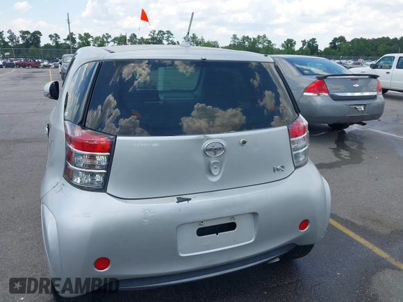 2013 Scion iQ with VIN JTNJJXB00DJ023345, listed as a IAAI auction lot 42631440 with 73,105 mi miles and . Bid and sale history available at DreamBid. Image 6.