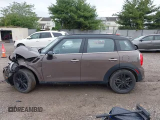 2014 MINI Countryman S with VIN WMWZC5C55EWP41717, listed as a IAAI auction lot 42324347 with Not provided miles and . Bid and sale history available at DreamBid. Image 15.