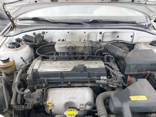 2001 Hyundai Accent GL with VIN KMHCG35C81U090873, listed as a IAAI auction lot 41436739 with 59,359 mi miles. Bid and sale history available at carsss.com. Image 10.