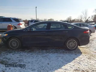2014 Ford Fusion Titanium with VIN 3FA6P0K90ER336116, listed as a IAAI auction lot 41559792 with 132,852 mi miles. Bid and sale history available at carsss.com. Image 14.