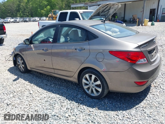 2014 Hyundai Accent GLS with VIN KMHCU4AE7EU736691, listed as a IAAI auction lot 42054514 with 80,715 mi miles and . Bid and sale history available at carsss.com. Image 3.
