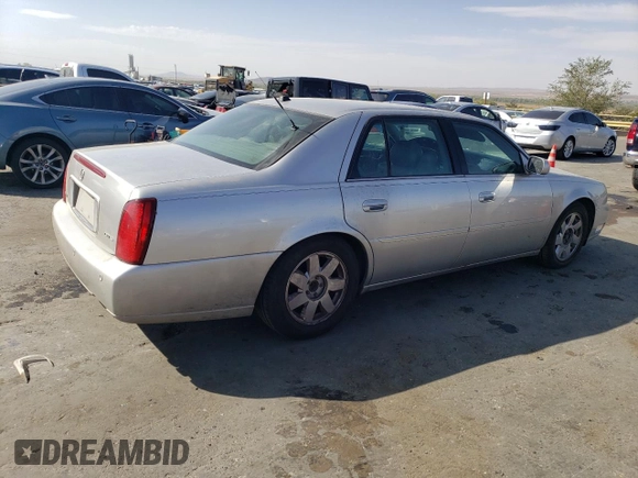 2004 Cadillac DeVille DTS z VIN 1G6KF57994U203706, wystawiony jako Copart lot #76278324 z przebiegiem 203 709 mil mil oraz Szkoda całkowita • Salvage title. Historia ofert i sprzedaży dostępna na DreamBid. Obrazek 3.