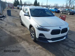 2023 BMW X2 xDrive28i with VIN WBXYJ1C00P5V29711, listed as a IAAI auction lot 41694315 with 40,813 mi miles. Bid and sale history available at carsss.com. Image 1.