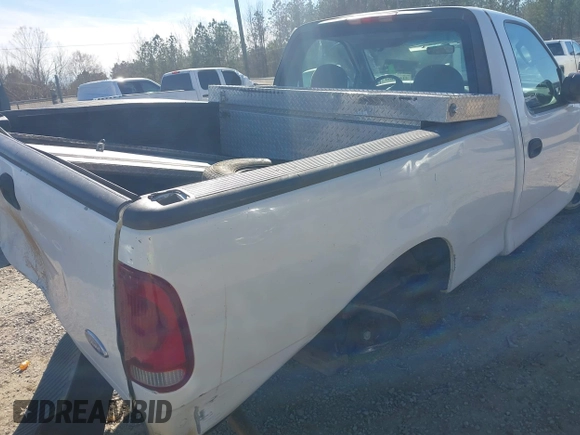 2003 Ford F-150 XL with VIN 2FTRF17W03CA59388, listed as a IAAI auction lot 41673651 with 221,668 mi miles and . Bid and sale history available at DreamBid. Image 17.