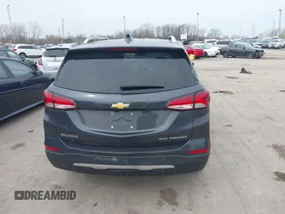 2022 Chevrolet Equinox Premier z VIN 2GNAXXEV9N6124156, wystawiony jako IAAI lot #42015711 z przebiegiem 65 808 mil mil oraz . Historia ofert i sprzedaży dostępna na DreamBid. Obrazek 16.