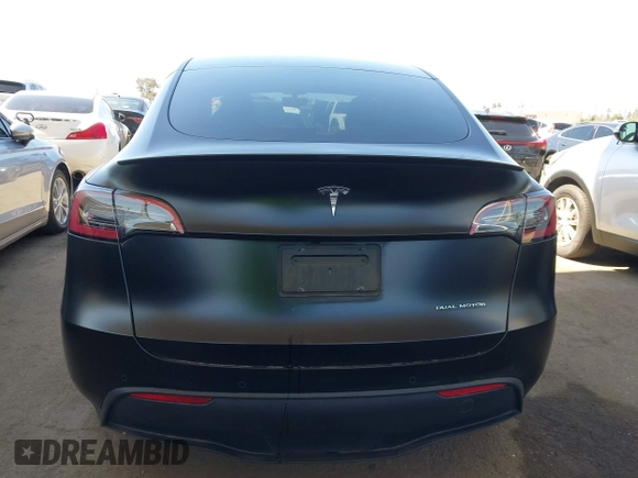 2022 Tesla Model Y Performance z VIN 7SAYGDEF0NF491586, wystawiony jako IAAI lot #42276747 z przebiegiem 117 203 mil mil oraz . Historia ofert i sprzedaży dostępna na DreamBid. Obrazek 16.